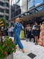 Denim Dahlia — side runway view showing the contrasting panel